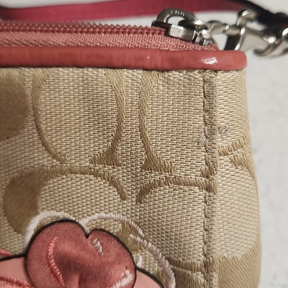 Coach Tan and Salmony Peachy Floral Detail